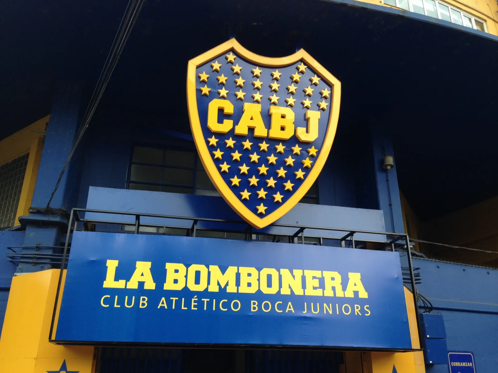 The emblem of the Argentine sports club Boca Juniors displayed on the exterior of their football stadium, La Bombonera, photographed in 2014.